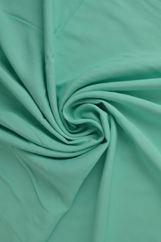 MINTGRÖN VISKOSTYG – LÄTT FALL & ELEGANT MATT GLANS