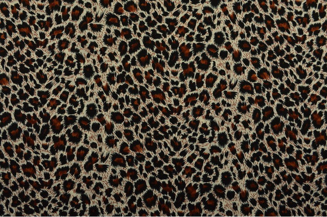 CREME BOMULDSPOPLIN MED LEOPARDPRINT – SORT & BRUN