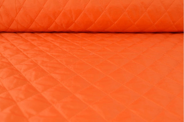 ORANGE QUILTAT TYG MED VADDERAD BAKSIDA