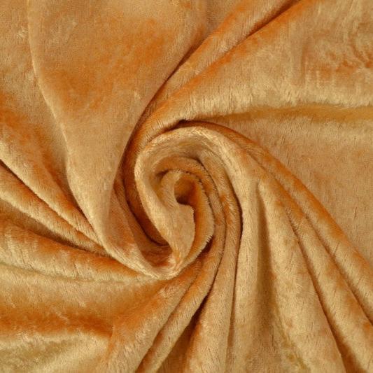 OKKERGUL NERVØS VELOUR – STRIKKET, STRÆKBAR & GLANSFULDT FALD