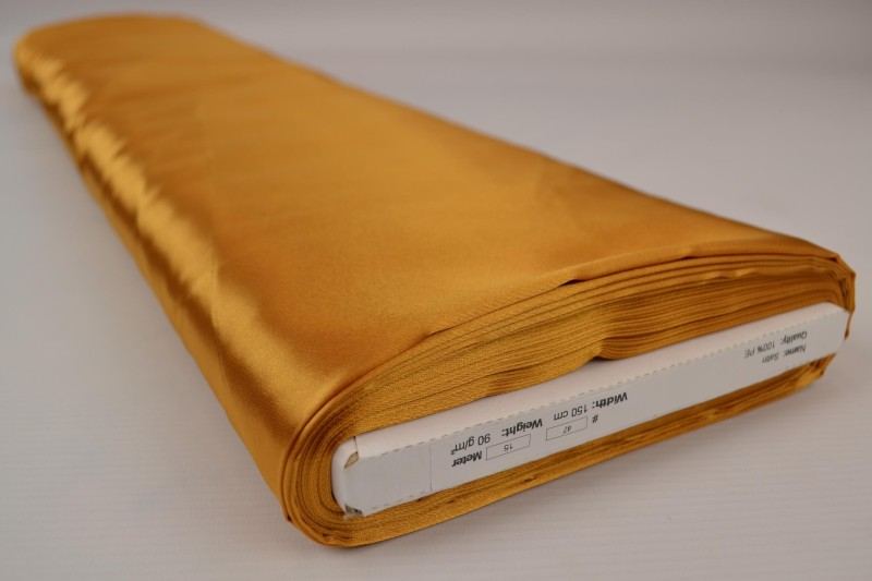 SOLGUL/GULD SATIN TYG – LÄTT & GLANSIGT