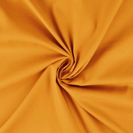 CURRYGUL BOMULLSPOPLIN – TÄTT VÄVT BOMULLSTYG