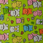 GRØN BOMULLSPOPLIN MED KAWAII BAMSETRYCK