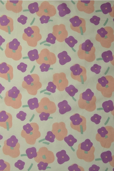 LYSEGRØN BOMULDSPOPLIN MED BLOMSTERPRINT – FERSKEN & LILLA