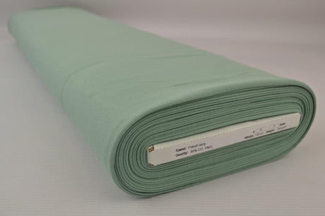 VINTAGEGRÖN FRENCH TERRY – MJUK BOMULLSSTICKAD METERVARA MED STRETCH