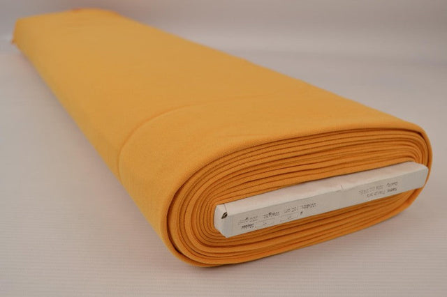 OKERGUL FRENCH TERRY – MJUK BOMULLSSTICKAD METERVARA MED STRETCH